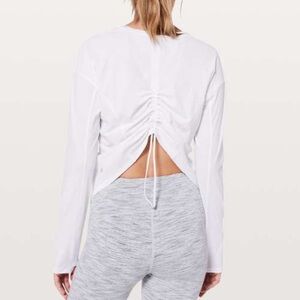 Lululemon on pace  long sleeve top with thumb holes and scruchable back